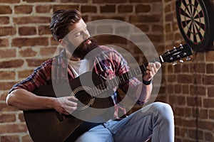 Stylish bearded musician