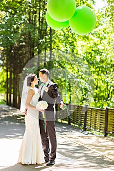 Stylish beautiful happy bride and groom, wedding celebrations outdoor