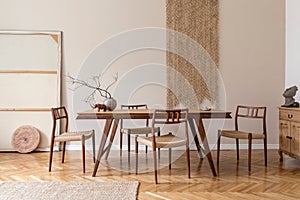 Stylish dining room in japandi interior design style.