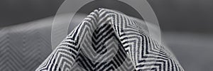 Stylish black and grey herringbone fabric texture background