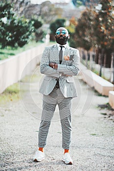 Stylish black guy in checkered suit