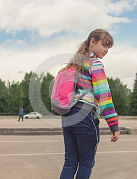 Stylish blonde girl trendy skateboard dynamic day outdoor