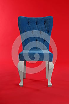 Stylish blue chair. Element of interior design
