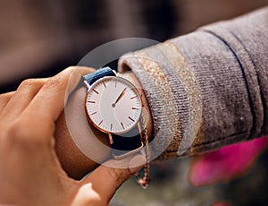 Stylish blue watch on woman hand