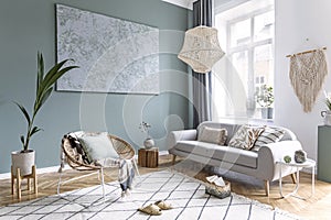 Boho interior design of living room with rattan armchair. photo