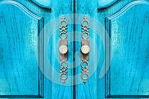 Stylish brass door handles on a cabinet or closet photo