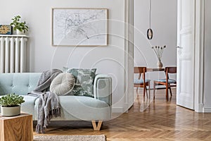 Stylish, bright, Scandinavian living room and dining room. photo