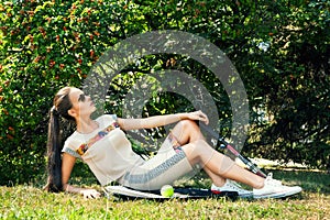 stylish brunette tennis player with racket