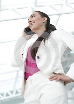 Stylish business lady talking on the phone