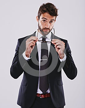 Stylish business. Studio shot of a handsome and well-dressed young man.