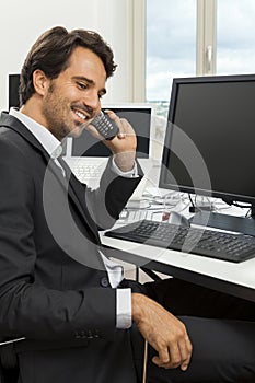 Stylish businessman chatting on the phone