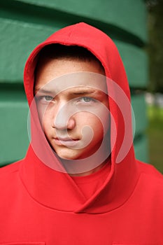Stylish casual teenage boy in fashionable hoodie