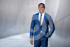 Stylish chic modern style business suit executive, african american male commercial model, walking to swanky office workplace