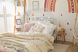 Stylish child`s room interior with comfortable bed