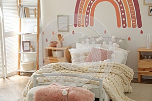 Stylish child`s room interior with comfortable bed