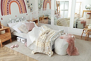 Stylish child`s room interior with comfortable bed