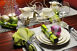 Stylish Christmas Eve Dinner Table Setting.