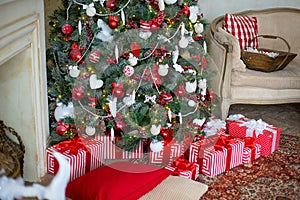 Stylish Christmas interior decorated in white and red colors