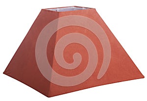 Stylish classic empire square red orange tapered lamp shade on a white background isolated close up shot