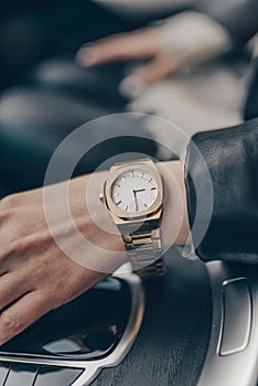 Stylish classic watch on woman hand