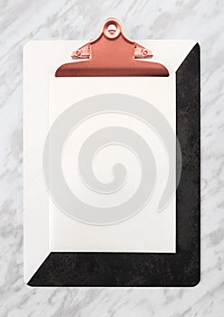 Stylish clipboard with blank sheet of paper