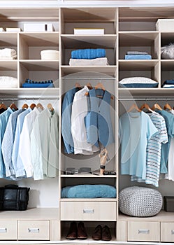 Stylish clothes, shoes and home stuff in large closet