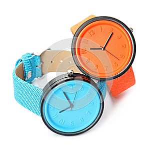 Stylish colorful wrist watches on white background. photo