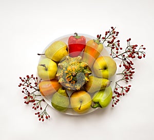 Stylish composition of vegetables, fruits, autumn berries. Top view on white background. Autumn flat lay