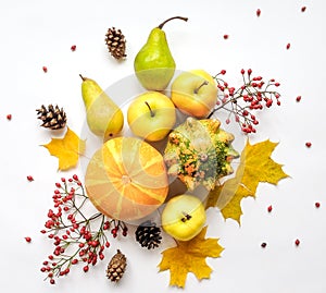 Stylish composition of vegetables, fruits, autumn leaves, berries. Top view on white background. Autumn flat lay