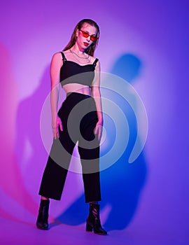 stylish confident girl stands on the background