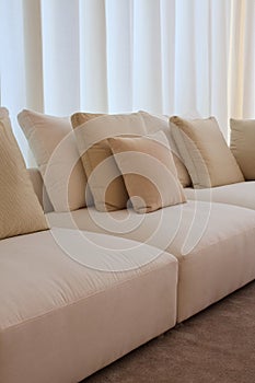 Stylish couch with curtaining