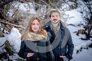 Stylish couple with trendy winter fashion