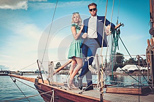 Stylish couple on a yacht
