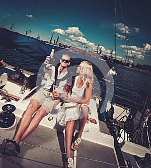 Stylish couple on a yacht