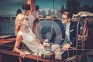 Stylish couple on a yacht