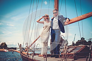 Stylish couple on a yacht