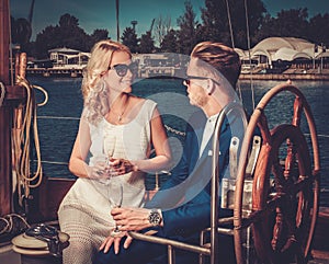 Stylish couple on a yacht