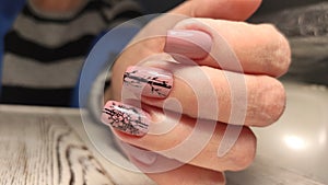 stylish design of manicure on beautiful nails