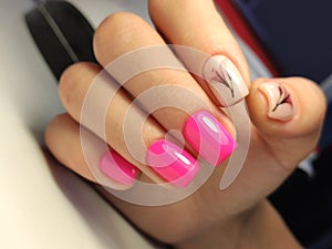 stylish design of manicure on beautiful nails