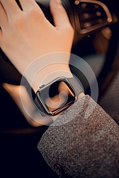 Stylish digital smart watch on woman hand, close-up