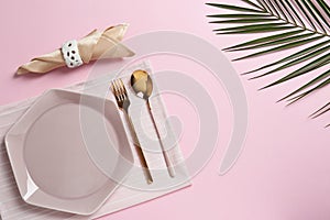 Stylish elegant table setting on color background. Space for text