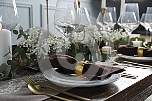 Stylish elegant table setting for festive dinner indoors