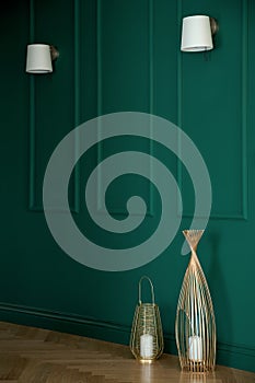 Stylish emerald green wall with molding