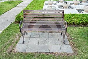 Stylish empty bench in park