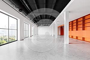 Stylish empty office interior orange shelves, panoramic window on skyscrapers