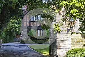 Stylish facade of an expensive residential home in summer