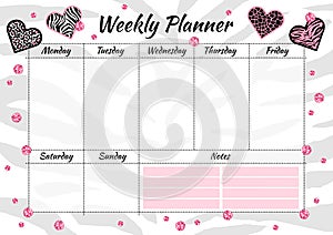 Creative weekly planner with heart animal texture and pink glitter sparkles. photo