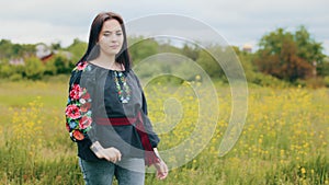 Stylish fashionable attractive girl female patriot model wears ukrainian summer dress blow traditional black patterned