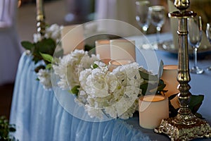 Stylish, fashionable wedding arch ceremony decorated with blue and white different flowers. Floral Design.Summer