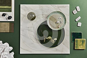 Stylish flat lay composition of creative architect moodboard design with samples of building, textile and natural materials. photo